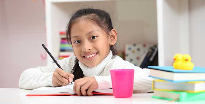 little girl doing homework