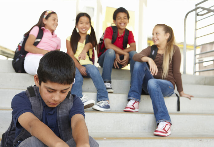 How to Help Your Teenager Navigate Peer Pressure and Bullying