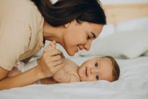 Newborn Playing with mom